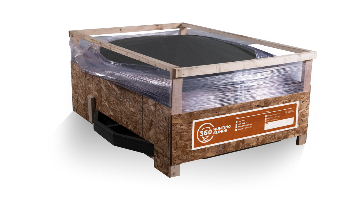 A 360 hunting blind packaged in kit form, crated on a shipping pallet with a labeled 360 Hunting Blinds shipping crate, ready for transport and on-site assembly